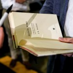 JD Vance autographs his book after a rally in Middletown, Ohio.